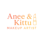 "Makeover By Anee & Kittu Makeup Artist" logo with soft multicolor lighting in warm pink, orange, and yellow tones. The text appears in a clean serif font, with a minimalist lipstick icon beside it, representing a professional makeup brand based in Udaipur.